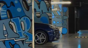 Graffiti and bright colors. Underground parking lot in Lucky Residential Complex