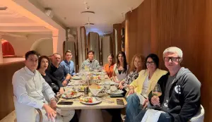 Oleg Torbosov at a dinner with Whitewill's top brokers this spring. And the company's top managers.
